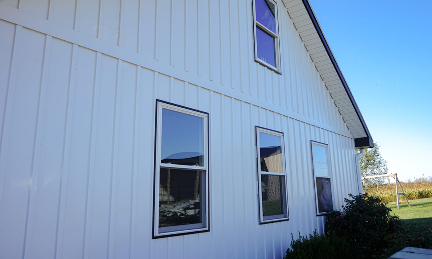 Barndominium with wraparound porch