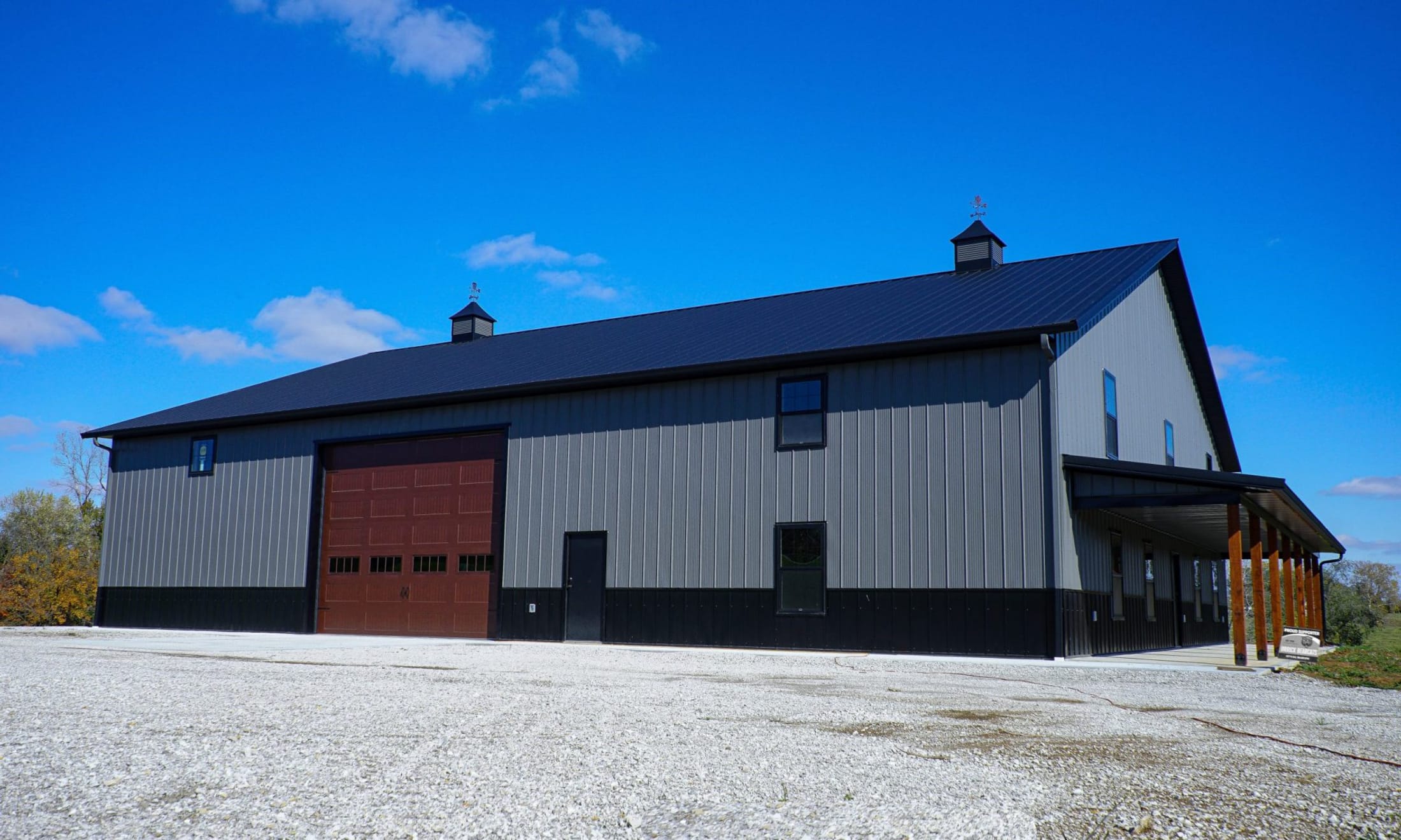 Grey building with black roof